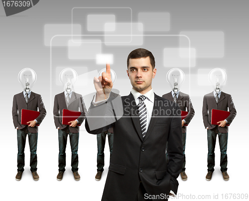Image of lamp head businesspeople with laptop
