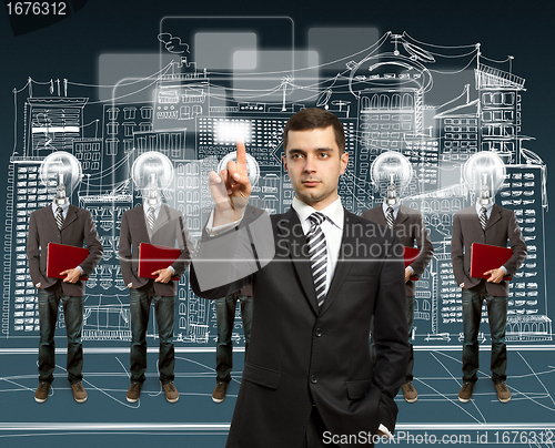 Image of lamp head businesspeople with laptop