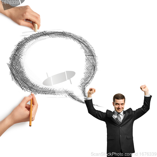 Image of human hands with speech bubble and man