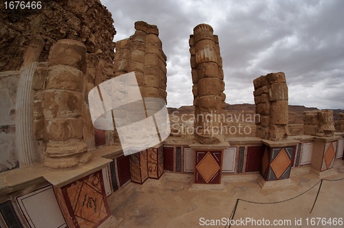 Image of Fisheye view of colonnade of ancient Masada palace of King Herod on cloudy day