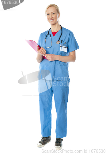 Image of Full length view of senior female doctor