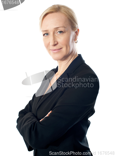 Image of Closeup shot of a senior businesswoman posing with folded arms