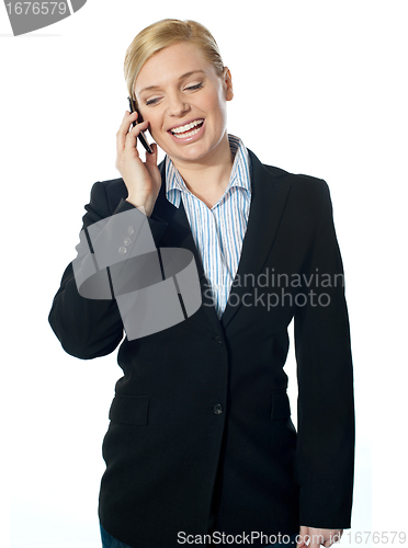 Image of Corporate female communicating on phone