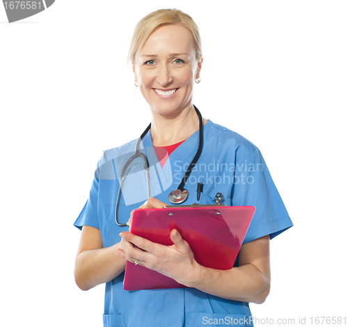 Image of Experienced female doctor smiling at camera