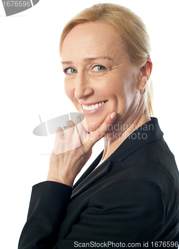 Image of Smiling senior corporate woman, closeup