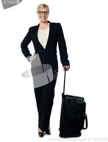 Image of Corporate person carrying trolley bag