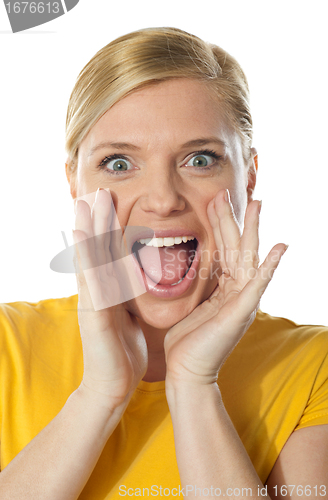 Image of Excited cute girl in front of camera