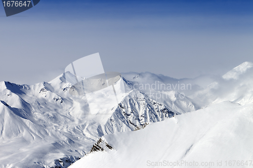 Image of Snowy mountains in haze