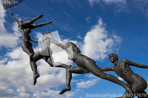 Image of Statues jumping