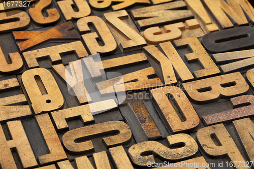 Image of antique wood alphabet abstract