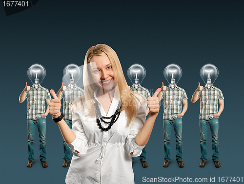 Image of woman and lamp head businesspeople with laptop