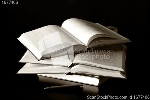 Image of books on black background