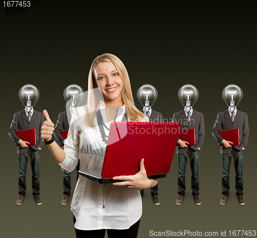 Image of woman and lamp head businesspeople with laptop