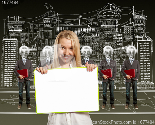 Image of woman and lamp head businesspeople with laptop