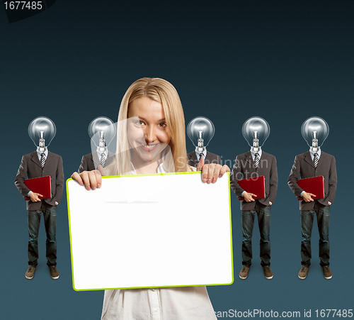 Image of woman and lamp head businesspeople with laptop