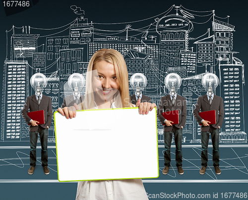 Image of woman and lamp head businesspeople with laptop