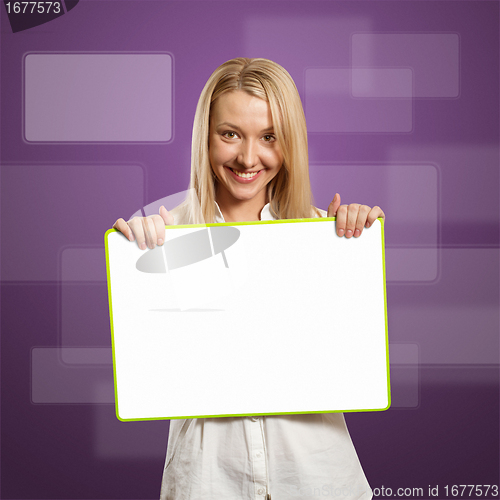 Image of happy businesswoman holding blank white card