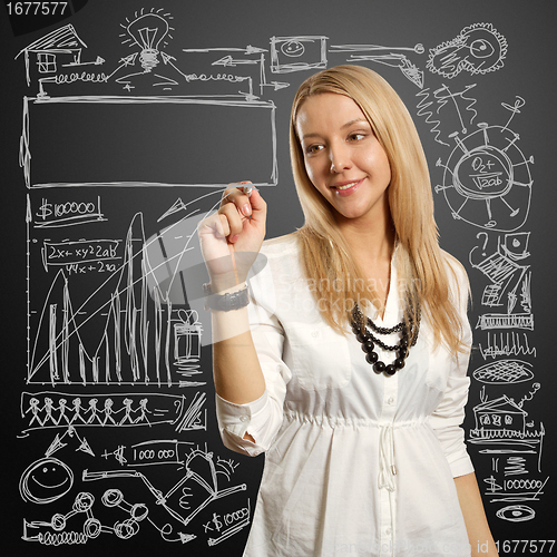 Image of businesswoman writing something