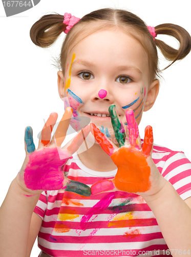 Image of Portrait of a cute girl with painted hands