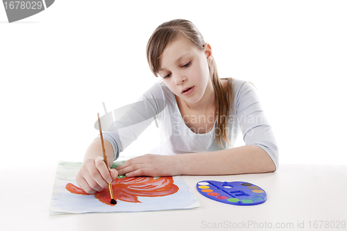 Image of Girl drawing color flower