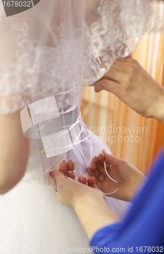 Image of Pre-ceremony bride dressing