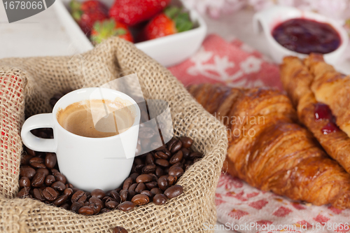 Image of Coffee and croissant