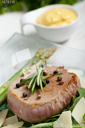 Image of Delicious Beef on arugula salad and parmesan