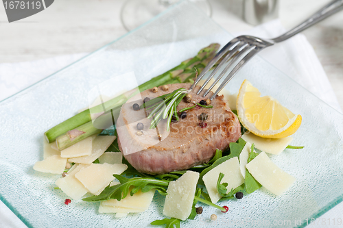 Image of Delicious Beef on arugula salad and parmesan