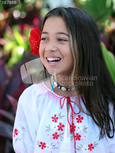 Image of Girl in a tropical garden