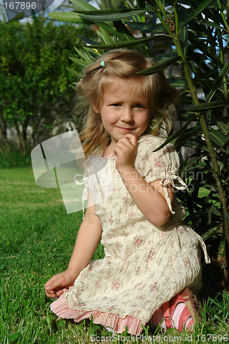 Image of the child on grass