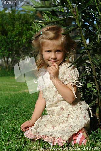 Image of the child on grass