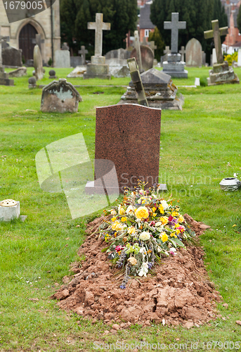 Image of Freshly dug grave in cemetery