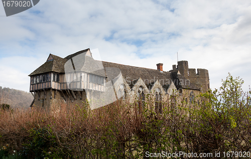 Image of Stokesay Castle in Shropshire surrounded by hedge