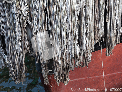 Image of Rope bumper on front of ship in dock