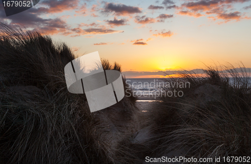 Image of Sunset over Formby Beach through dunes