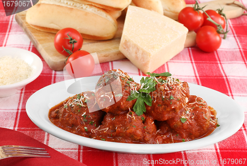 Image of Italian meatballs in an oval dish.