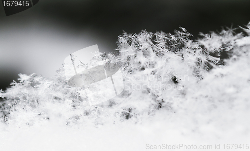 Image of Snowflake in white snow
