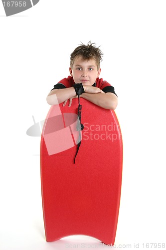 Image of Child resting with a bodyboard