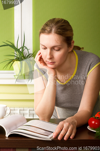 Image of Pregnant Woman on Kitchen 