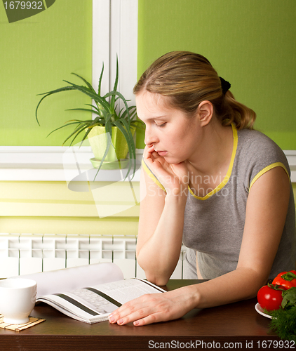 Image of Pregnant Woman on Kitchen 