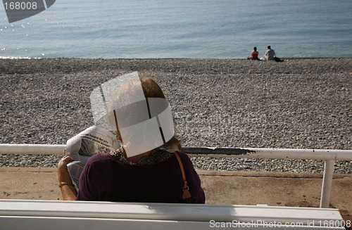 Image of Reading newspaper