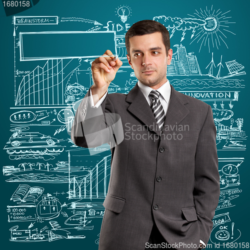 Image of Businessman Writing Something