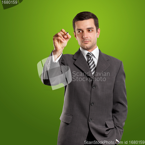 Image of Businessman Writing Something