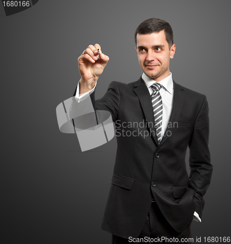 Image of Businessman Writing Something