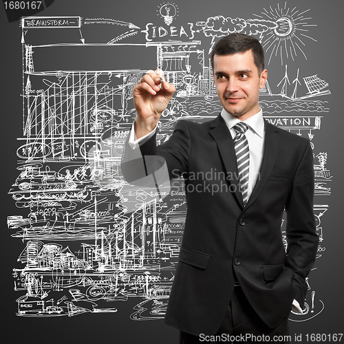 Image of Businessman Writing Something