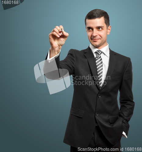 Image of Businessman Writing Something