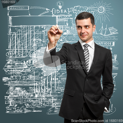 Image of Businessman Writing Something