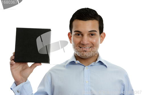 Image of Salesman holding a product, book or other merchandise