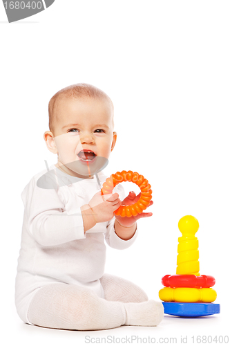 Image of Small child play with toys on white background