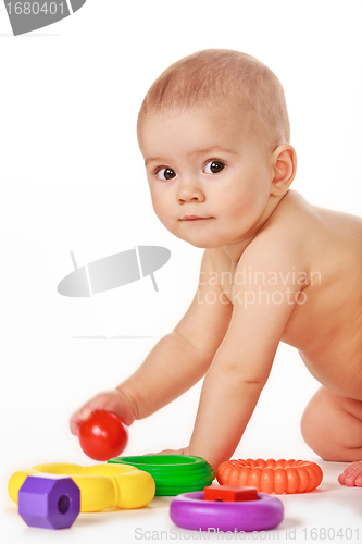 Image of Small child play with toys on white background